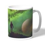 كوب قهوة بتصميم رحله الى الفضاء