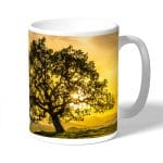 كوب قهوة بتصميم شجره الغروب