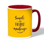 كوب قهوة بمقبض احمر بتصميم ابتسامه