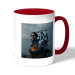 كوب قهوة بمقبض احمر بتصميم سام بريدجز ديث ستراندنغ