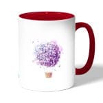 كوب قهوة بمقبض احمر بتصميم منطاد بالورد