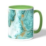 كوب قهوة بمقبض اخضر بتصميم أزرق ذهبي