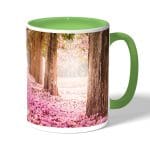 كوب قهوة بمقبض اخضر بتصميم اشجار الساكورا