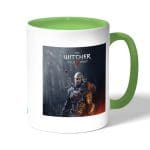 كوب قهوة بمقبض اخضر بتصميم الامساك برؤوس الوحوش ذا ويتشر 3 وايلد هانت