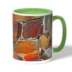 كوب قهوة بمقبض اخضر بتصميم صخور ملونه