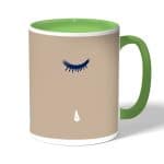 كوب قهوة بمقبض اخضر بتصميم عيون تبكي