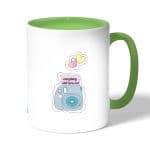 كوب قهوة بمقبض اخضر بتصميم كرتون كاميرا