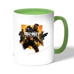 كوب قهوة بمقبض اخضر بتصميم كول أوف ديوتي بلاك أوبس