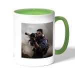 كوب قهوة بمقبض اخضر بتصميم كول أوف ديوتي قناص