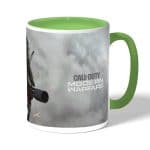 كوب قهوة بمقبض اخضر بتصميم كول أوف ديوتي مودرن وورفير