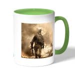 كوب قهوة بمقبض اخضر بتصميم كول أوف ديوتي نيران المعركه