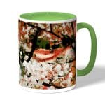 كوب قهوة بمقبض اخضر بتصميم ورود