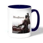 كوب قهوة بمقبض ازرق داكن بتصميم  بلود بورن