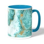 كوب قهوة بمقبض ازرق فاتح بتصميم أزرق ذهبي