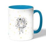 كوب قهوة بمقبض ازرق فاتح بتصميم النجوم والأحلام