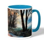 كوب قهوة بمقبض ازرق فاتح بتصميم انعكاس الغروب