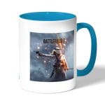 كوب قهوة بمقبض ازرق فاتح بتصميم باتلفيلد 1 معركه العرب