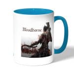 كوب قهوة بمقبض ازرق فاتح بتصميم  بلود بورن