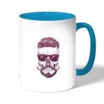 كوب قهوة بمقبض ازرق فاتح بتصميم جمجمه انيقه