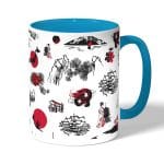 كوب قهوة بمقبض ازرق فاتح بتصميم رسومات يابانيه