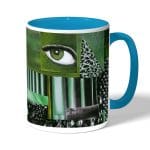 كوب قهوة بمقبض ازرق فاتح بتصميم فن تجريدي