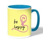 كوب قهوة بمقبض ازرق فاتح بتصميم كن سعيد