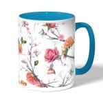 كوب قهوة بمقبض ازرق فاتح بتصميم مورد