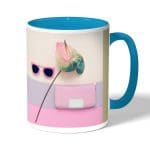 كوب قهوة بمقبض ازرق فاتح بتصميم ورد مميز