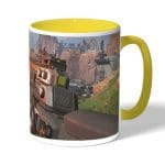 كوب قهوة بمقبض اصفر بتصميم أبيكس ليجندز سلاح