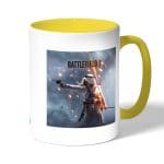 كوب قهوة بمقبض اصفر بتصميم باتلفيلد 1 معركه العرب