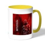 كوب قهوة بمقبض اصفر بتصميم باتلفيلد 4