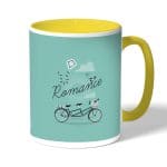 كوب قهوة بمقبض اصفر بتصميم دراجه هوائيه