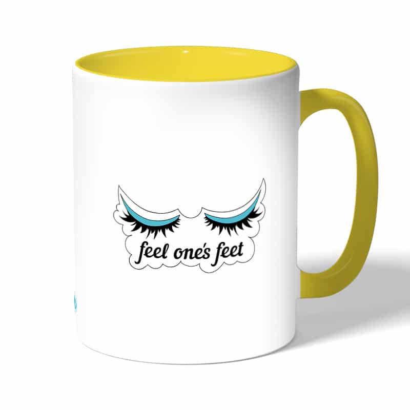 كوب قهوة بمقبض اصفر بتصميم رموش كوب قهوة بمقبض اصفر بتصميم رموش