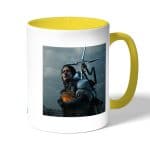 كوب قهوة بمقبض اصفر بتصميم سام بريدجز ديث ستراندنغ