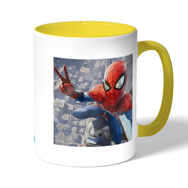 كوب قهوة بمقبض اصفر بتصميم سبايدر مان اعلى البرج كوب قهوة بمقبض اصفر بتصميم سبايدر مان اعلى البرج