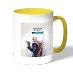 كوب قهوة بمقبض اصفر بتصميم قضاء على الوحوش ذا ويتشر