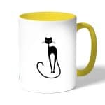 كوب قهوة بمقبض اصفر بتصميم قطه انيقه