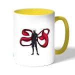 كوب قهوة بمقبض اصفر بتصميم قوة كانيكي طوكيو الغول