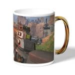 كوب قهوة بمقبض ذهبي بتصميم أبيكس ليجندز سلاح