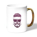 كوب قهوة بمقبض ذهبي بتصميم جمجمه انيقه