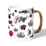 كوب قهوة بمقبض ذهبي بتصميم رسومات يابانيه