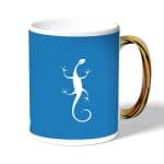 كوب قهوة بمقبض ذهبي بتصميم سحليه