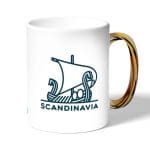 كوب قهوة بمقبض ذهبي بتصميم سفينة