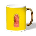 كوب قهوة بمقبض ذهبي بتصميم صبار