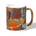 كوب قهوة بمقبض ذهبي بتصميم صخور ملونه