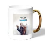 كوب قهوة بمقبض ذهبي بتصميم قضاء على الوحوش ذا ويتشر