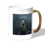 كوب قهوة بمقبض ذهبي بتصميم قوة جيرالت من ريفي ذا ويتشر 3 وايلد هانت