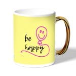 كوب قهوة بمقبض ذهبي بتصميم كن سعيد