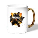 كوب قهوة بمقبض ذهبي بتصميم كول أوف ديوتي بلاك أوبس