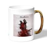 كوب قهوة بمقبض ذهبي بتصميم لعبه بلود بورن